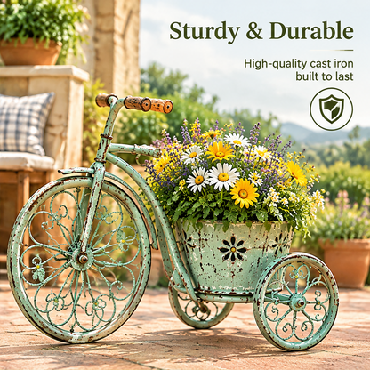 Angled view of a mint green tricycle planter beside text highlighting sturdy cast iron construction.